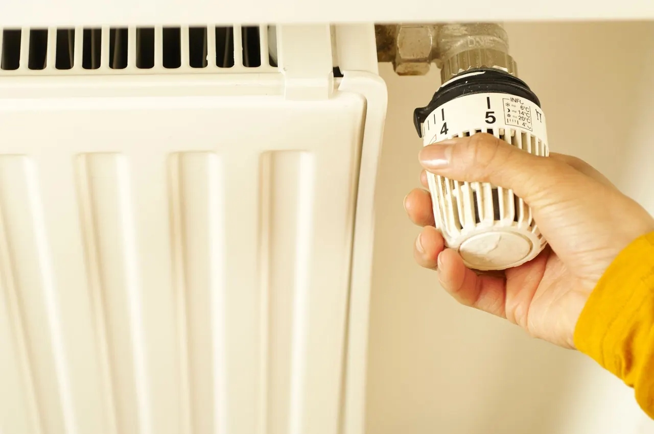 Technician working on an electric water heater